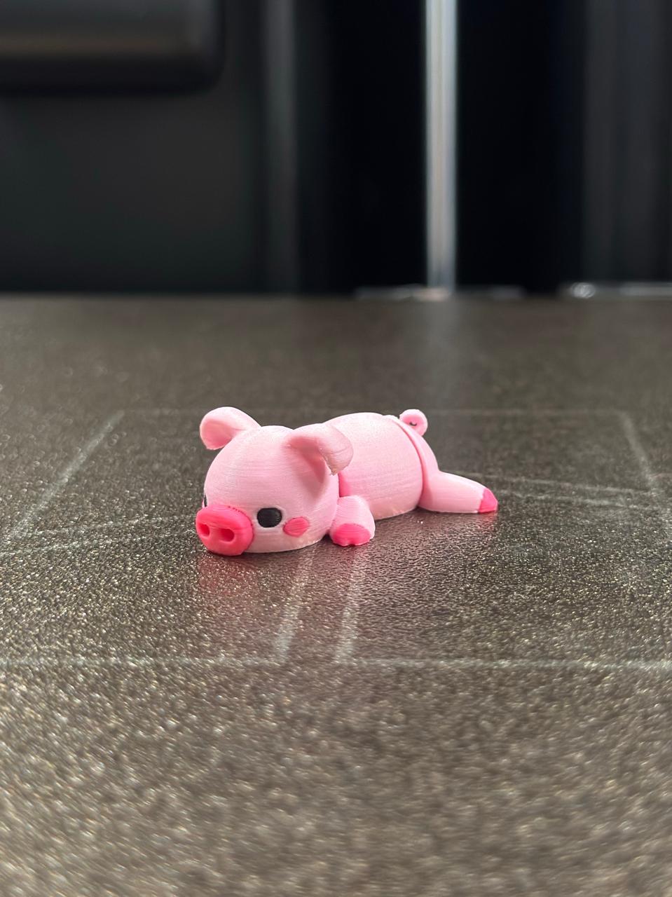 Cochonnet articulé rose